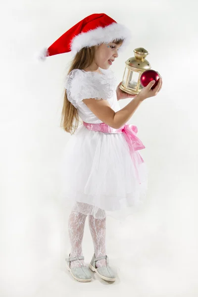Claus şapka, sevimli küçük kız — Stok fotoğraf