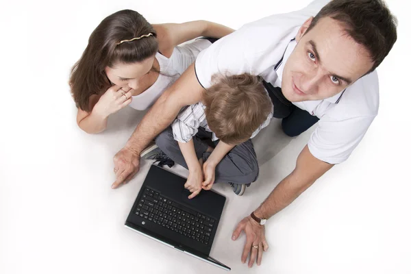 Family and computer — Stock Photo, Image