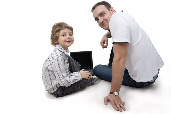 Padre e hijo con la computadora . —  Fotos de Stock