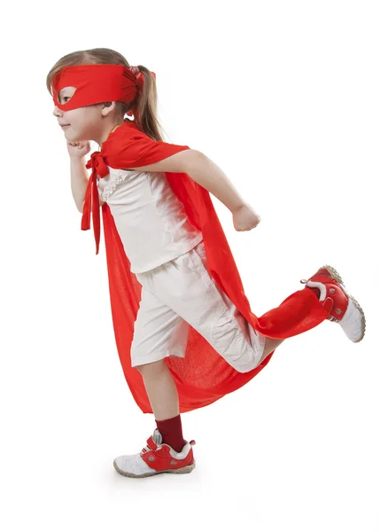 Superhjälte flicka i en röd — Stockfoto