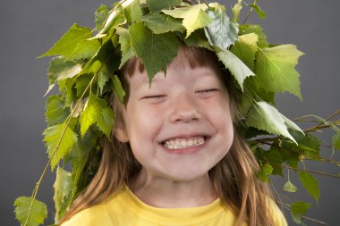 Portrait of the cheerful little girl clipart