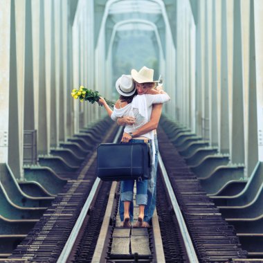 Couple on train tracks clipart