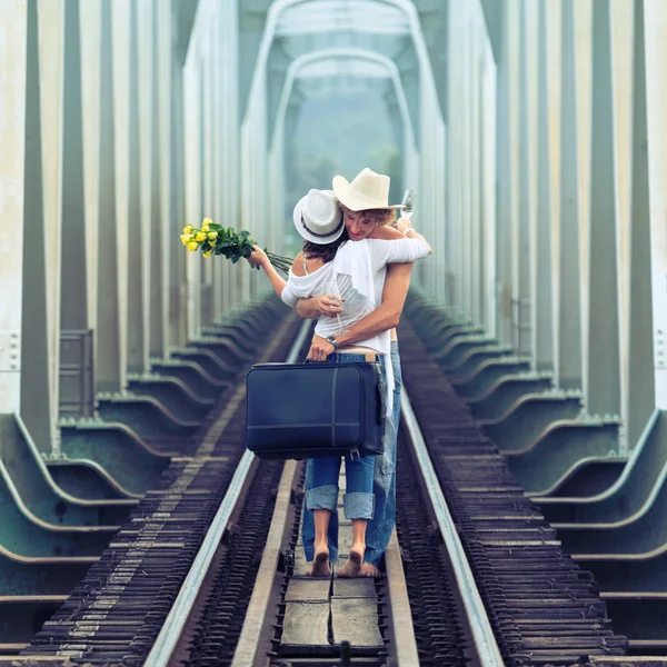 Couple on train tracks — Stock Photo, Image