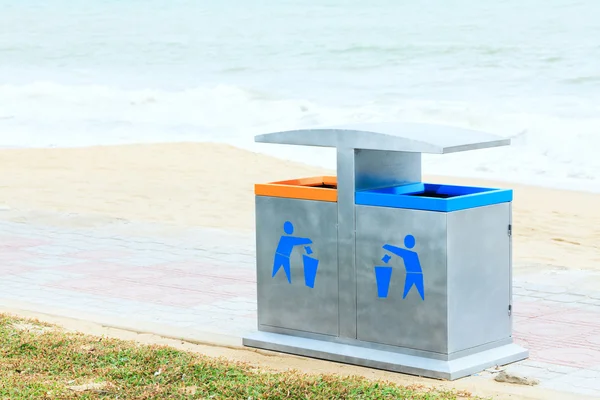 stock image Two recycling bin on the beach. Environmental protection