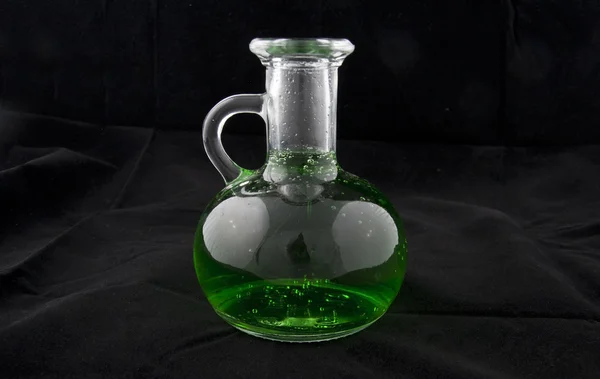 The bottle of green poison — Stock Photo, Image