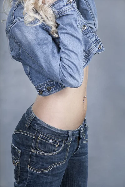 Close-up blonde woman with naked abdomen — Stock Photo, Image