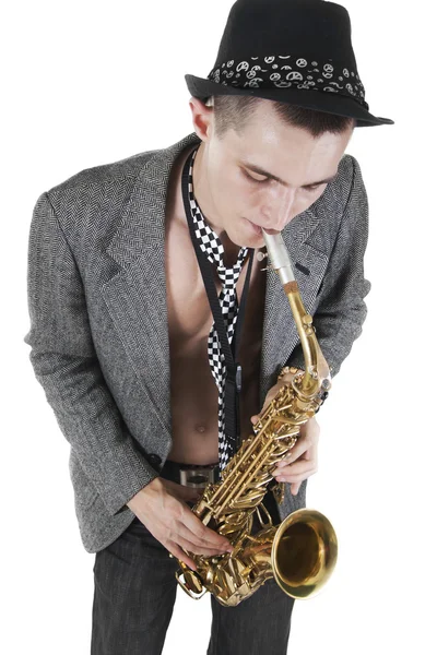 The young jazzman plays a saxophone — Stock Photo, Image