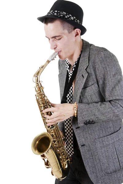The young jazz man plays a saxophone — Stock Photo, Image