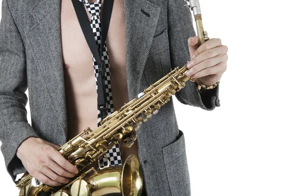 The young jazzman with a saxophone — Stock Photo, Image