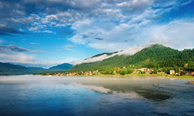 Village on the lakeside, Teletskoe lake clipart