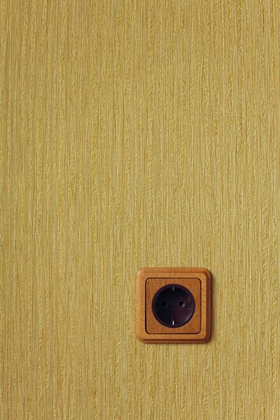 Wooden wall outlet — Stock Photo, Image