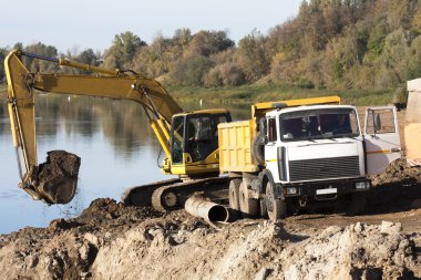 Yellow excavator clipart