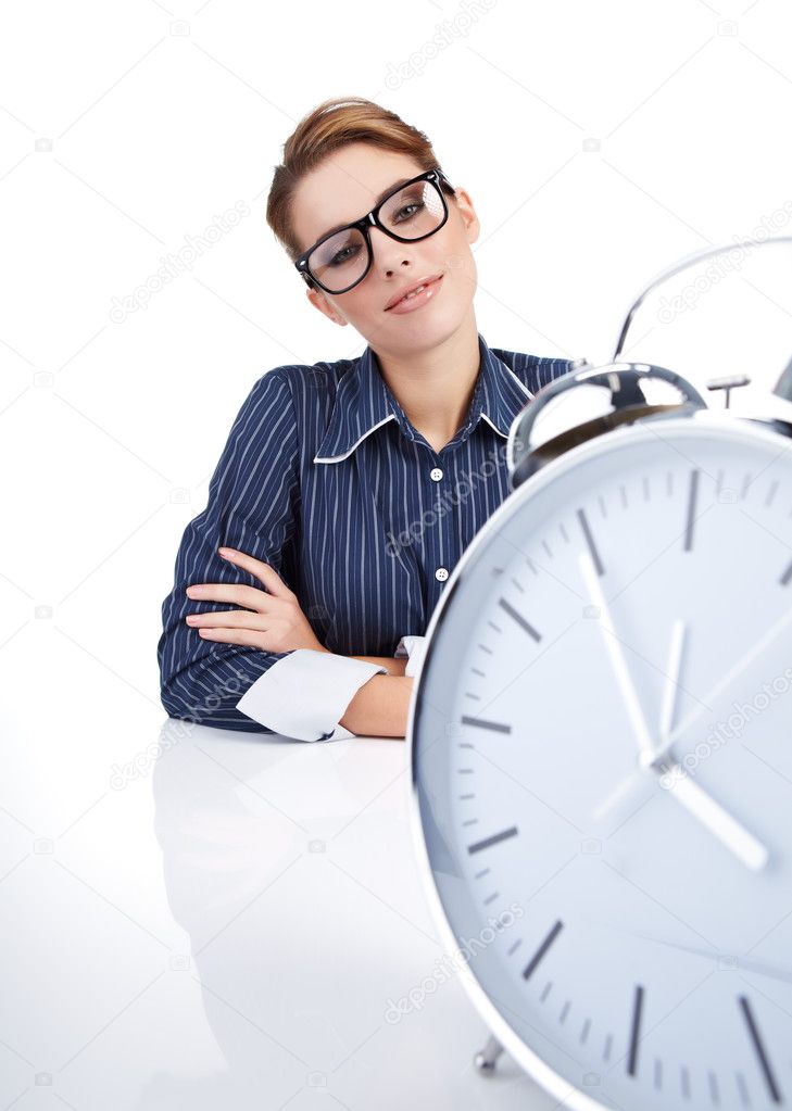 Picture of woman holding big clock over white