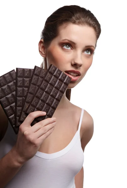 Portret van mooie vrouw met een chocolade — Stockfoto