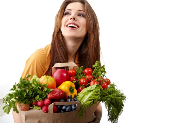 Mulher segurando um saco cheio de comida saudável. compras  . — Fotografia de Stock