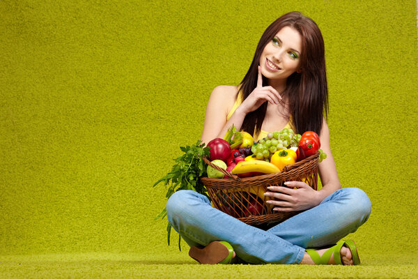 Young woman shopping for vegetables