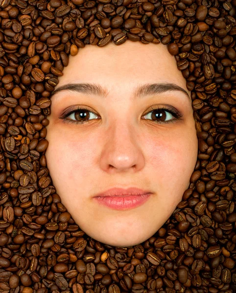 Coffee beans around face — Stock Photo, Image