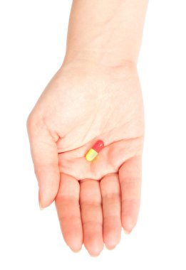 Hand holding a drug clipart