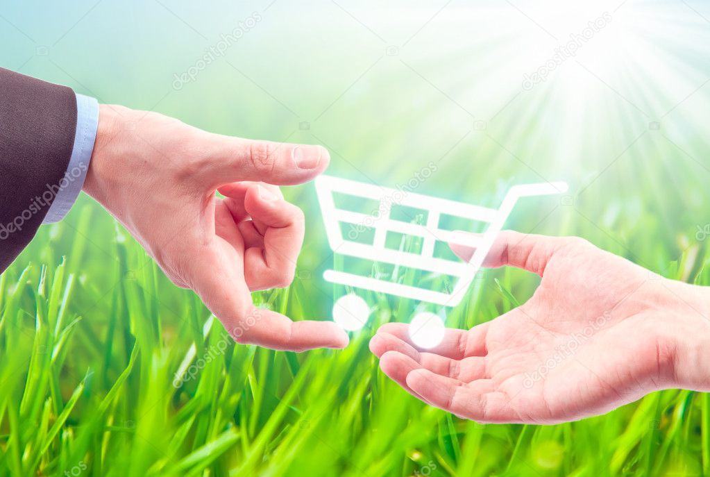 Hand gives a shopping cart