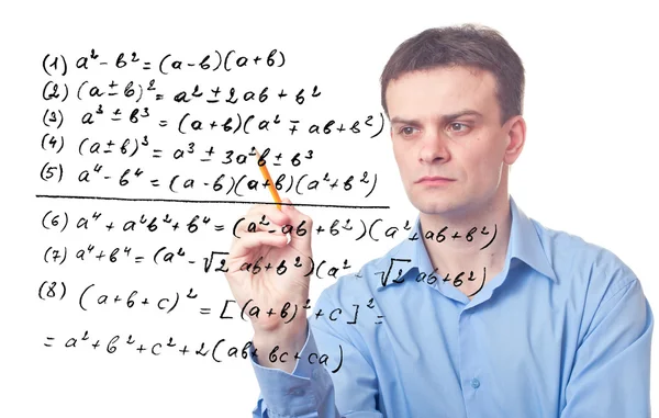 Молодой учитель и математическая формула — стоковое фото