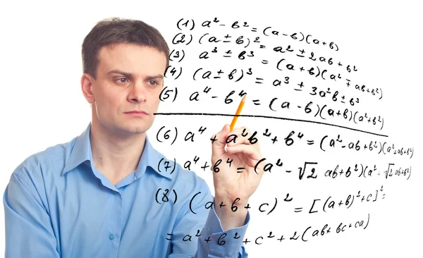 Young teacher and Mathematical formula. — Stock Photo, Image