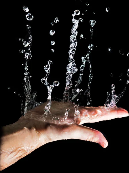 Main et eau — Photo