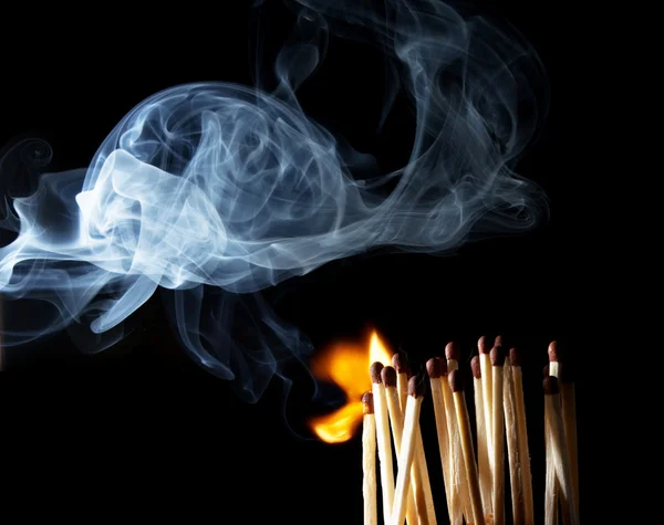 Matcher med elden — Stockfoto