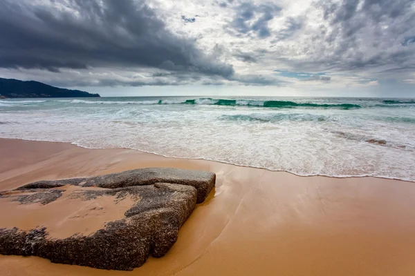 stock image Tropical beach under gloomy sky