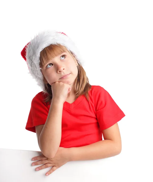 Menina no chapéu de Natal — Fotografia de Stock
