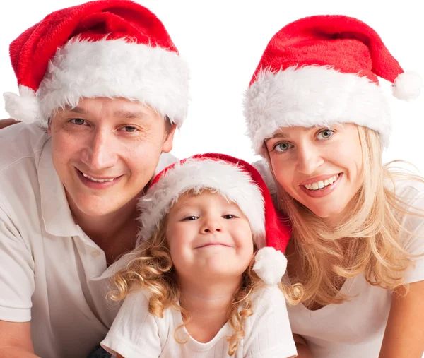 クリスマス帽子白で隔離される幸せ家族 ストックフォト