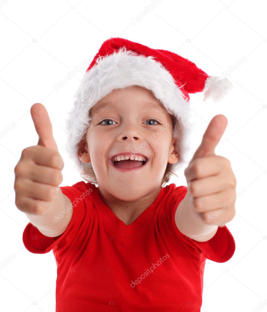 Happy child in christmas hat isolated on white