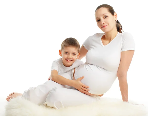 Gravid kvinna med son — Stockfoto