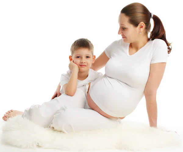 Těhotná žena se synem — Stock fotografie