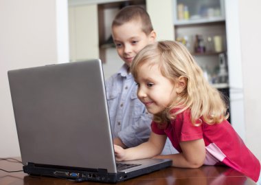 Children with laptop clipart