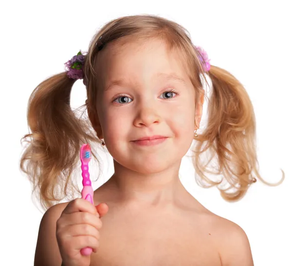 Маленька дівчинка з зубною щіткою — стокове фото