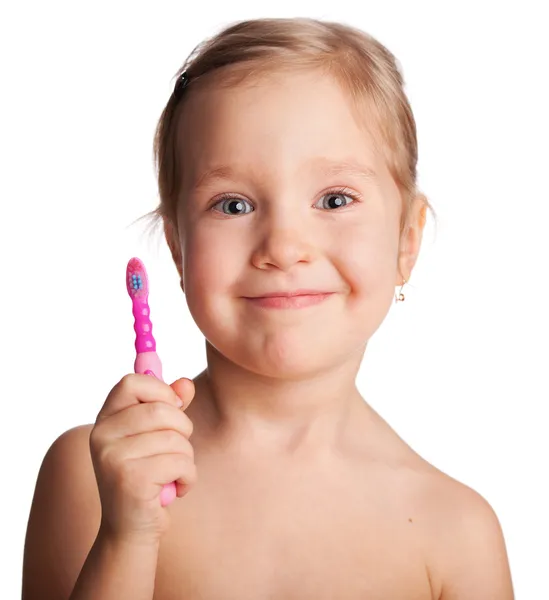 Маленька дівчинка з зубною щіткою — стокове фото