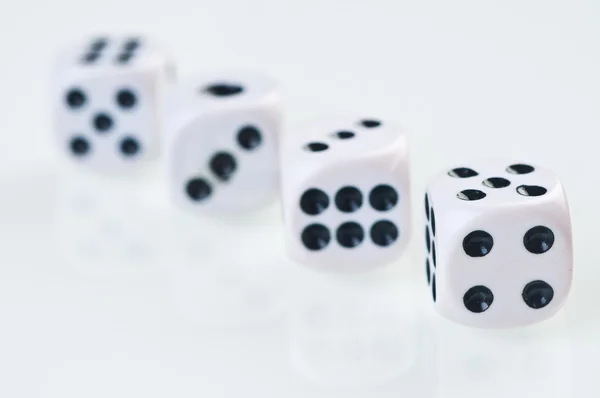 stock image Dices falling down against white background.