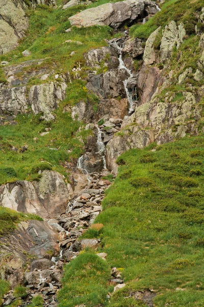 stock image Waterfall in green nature in Switzerland