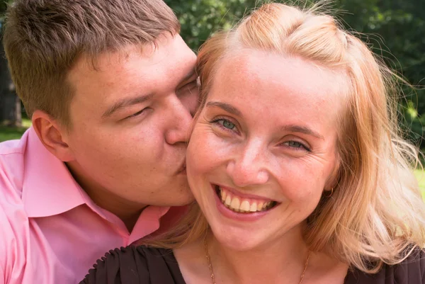 Husband kisses a wife — Stock Photo, Image
