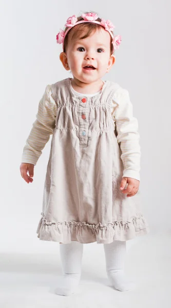 stock image Portrait of the small beautiful girl on a white background