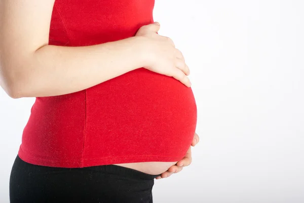 임신한 여자의 뱃속을 닫습니다 — 스톡 사진