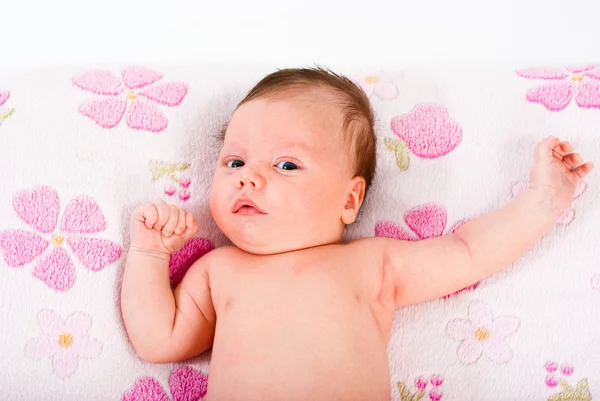 The small child on a pink blanket — Stock Photo, Image