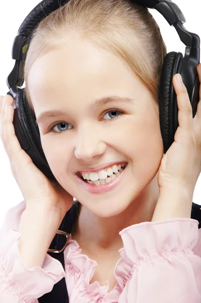 Menina criança em fones de ouvido — Fotografia de Stock