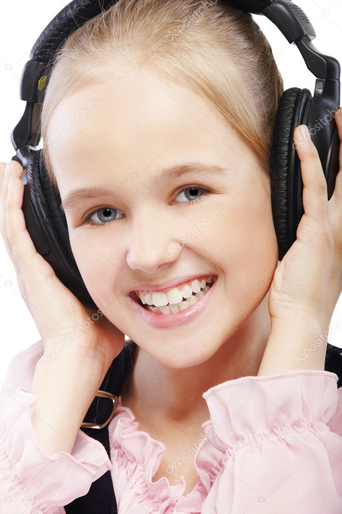 Kid girl in headphones
