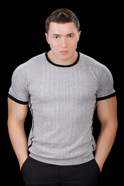 Strong man in t-shirt — Stock Photo, Image