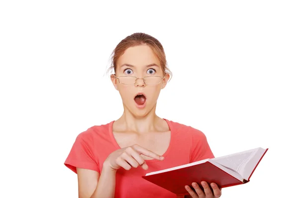 Surprised girl with book — Stock Photo, Image