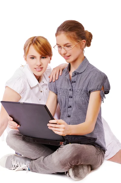 Two girls with notebook — Stock Photo, Image
