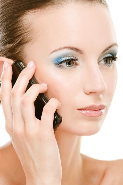 Mujer joven llama por teléfono celular — Foto de Stock