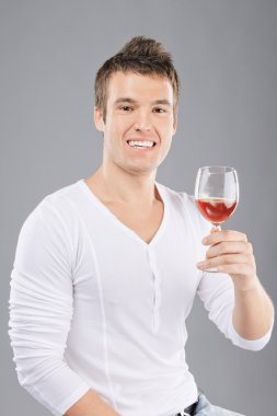 Young man pick up a wineglass clipart