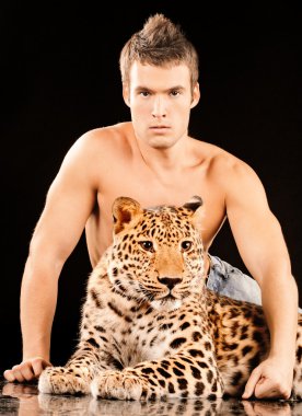 Young man and spotty leopard clipart